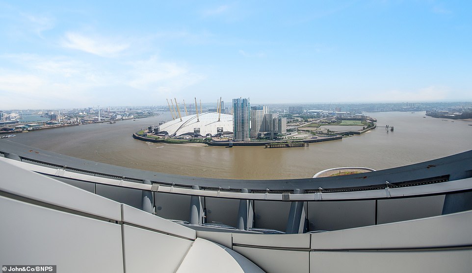 The Millennium Dome is visible from an outside dining area as the penthouse looks out over Greenwich in south London. The property recently housed three of the Premier League players