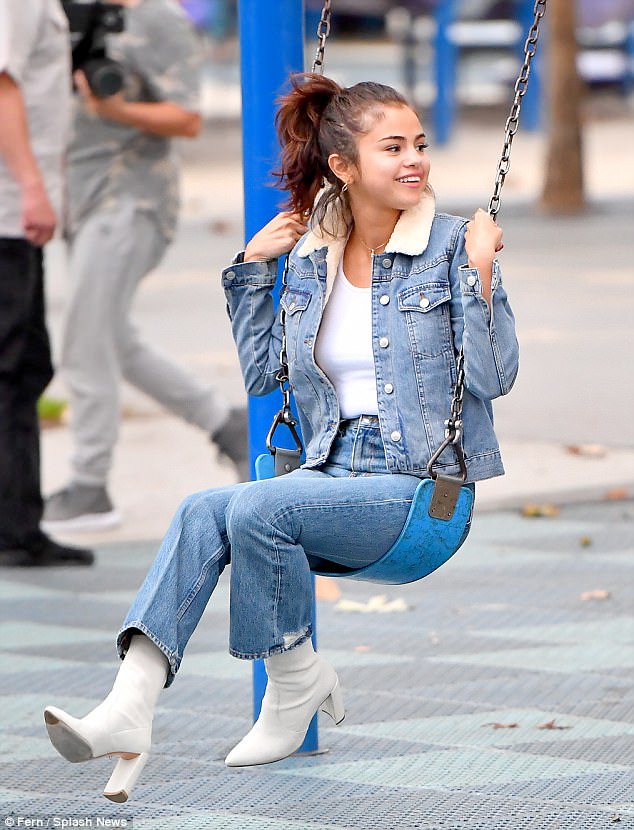 Kicking it: Selena Gomez certainly appeared to be in fantastic spirits as she headed was all smiles as she grabbed a juice at celebrity hot spot Alfred's, accompanied by her personal assistant Theresa Mingus in Mid-city Los Angeles