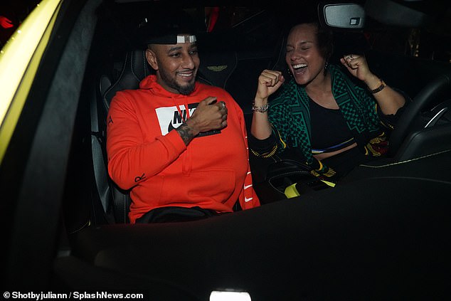 Happy couple: Swizz surprised her by turning the New York City hotspot Tao into a roller skating rink, inviting high-profile friends like Nas an Lala Anthony