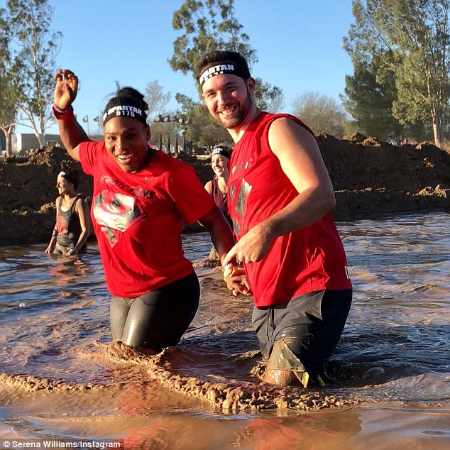 Teamwork! Williams and her husband Alexis made their way through a pool of mud