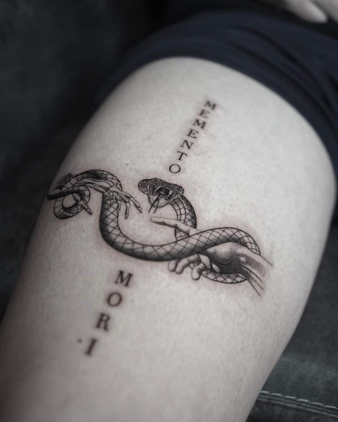 Snake tattoo for women by