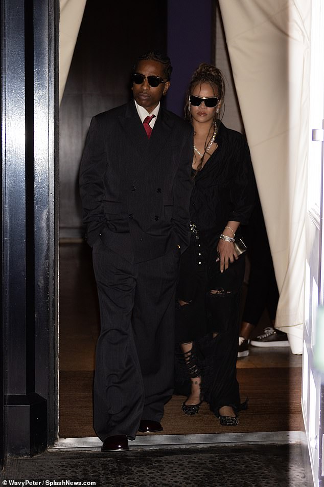 The parents-of-two matched in all-black outfits for a night out together