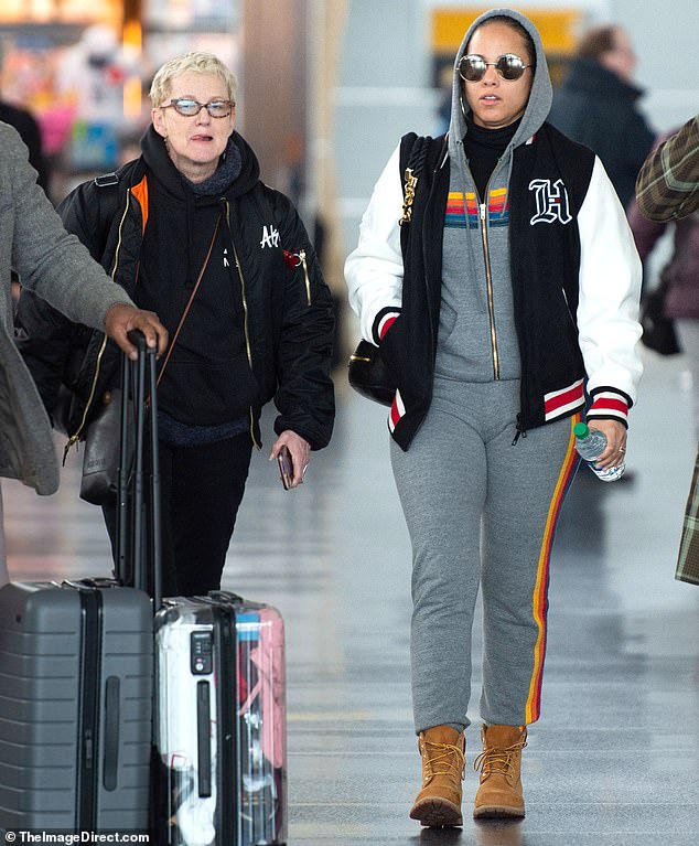 Family time: Alicia Keys was spotted strolling with her mother Terria Joseph through JFK Airport in beloved hometown New York City this Monday