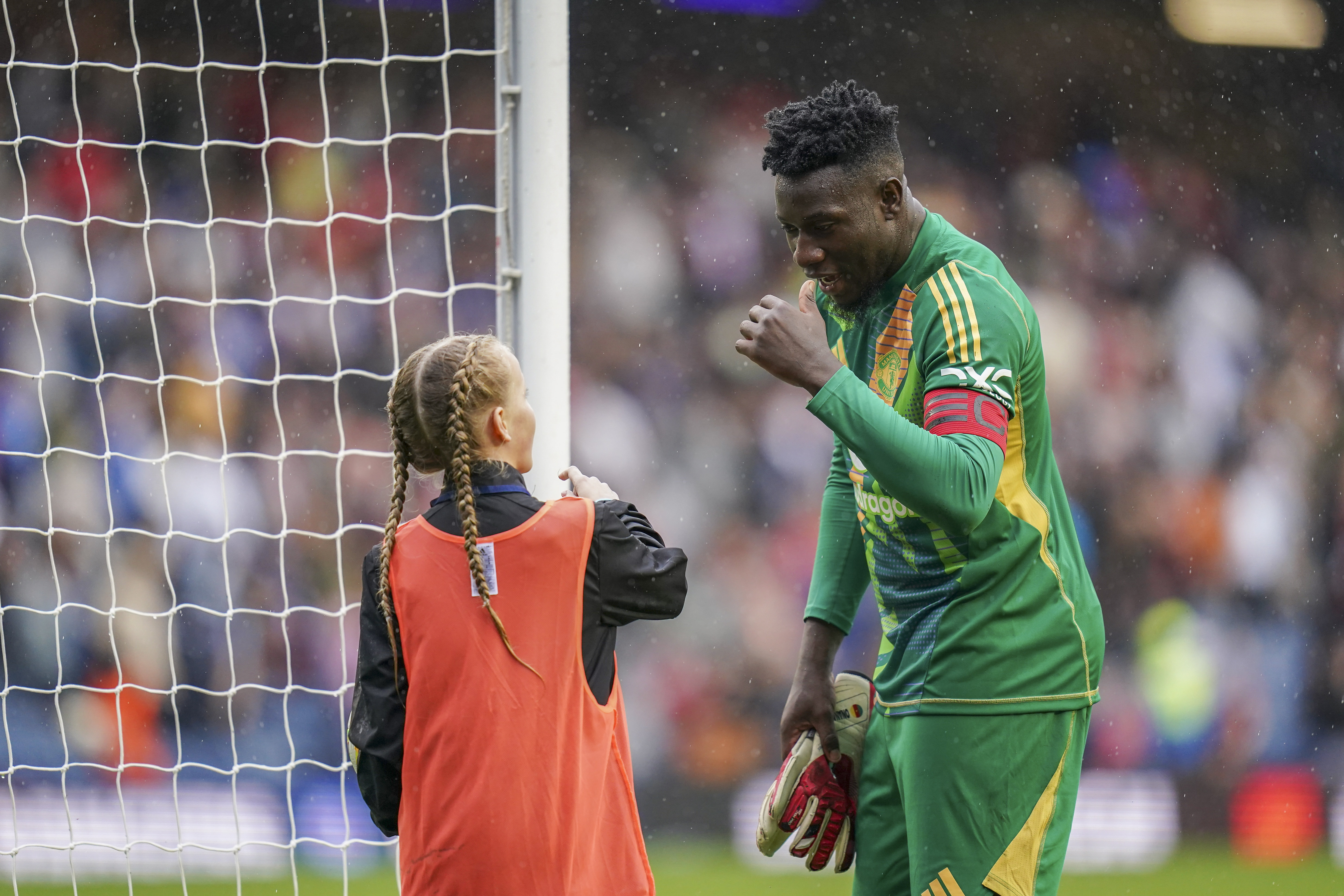 A ball girl approached the Man Utd stopper after their win over Rangers