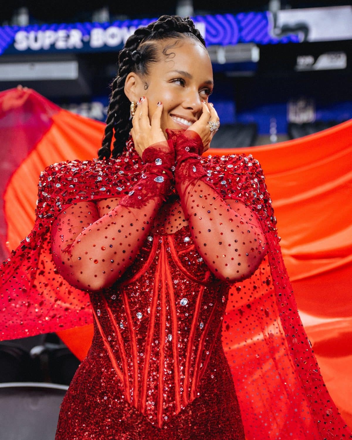 Alicia Keys in Dolce&Gabbana: Red Reigned Supreme At Super Bowl LVIII Game