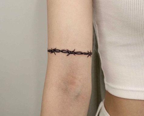 Top 10 women barbwire tattoo ideas and inspiration